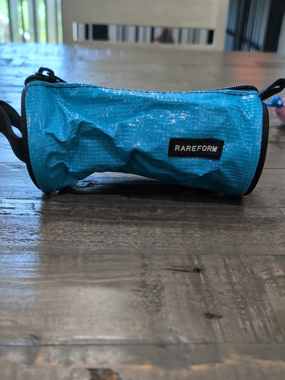Teal Cylinder Pouch